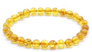 Armband Donker Barnsteen kralen 6mm